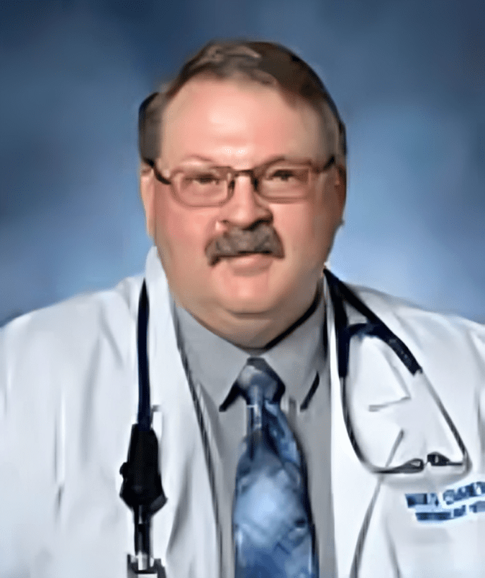 A man in white coat and glasses with stethoscope.